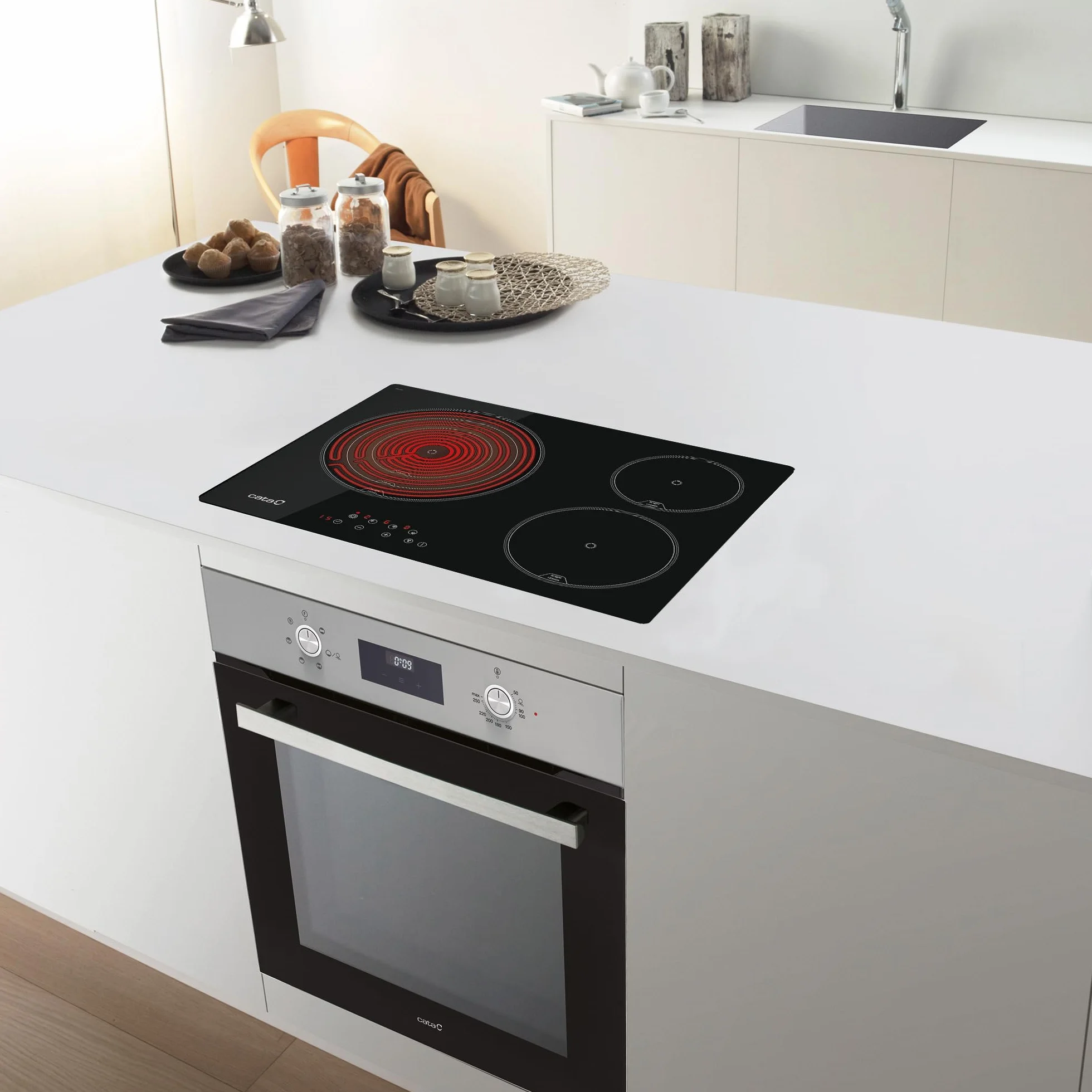 Cata | Placa de inducción | Modelo TT 5003/G | 3 Zonas de Cocción | Placa con 9 Niveles de Potencia Regulables + Booster | Ancho de 59cm | Acabado en Color Negro