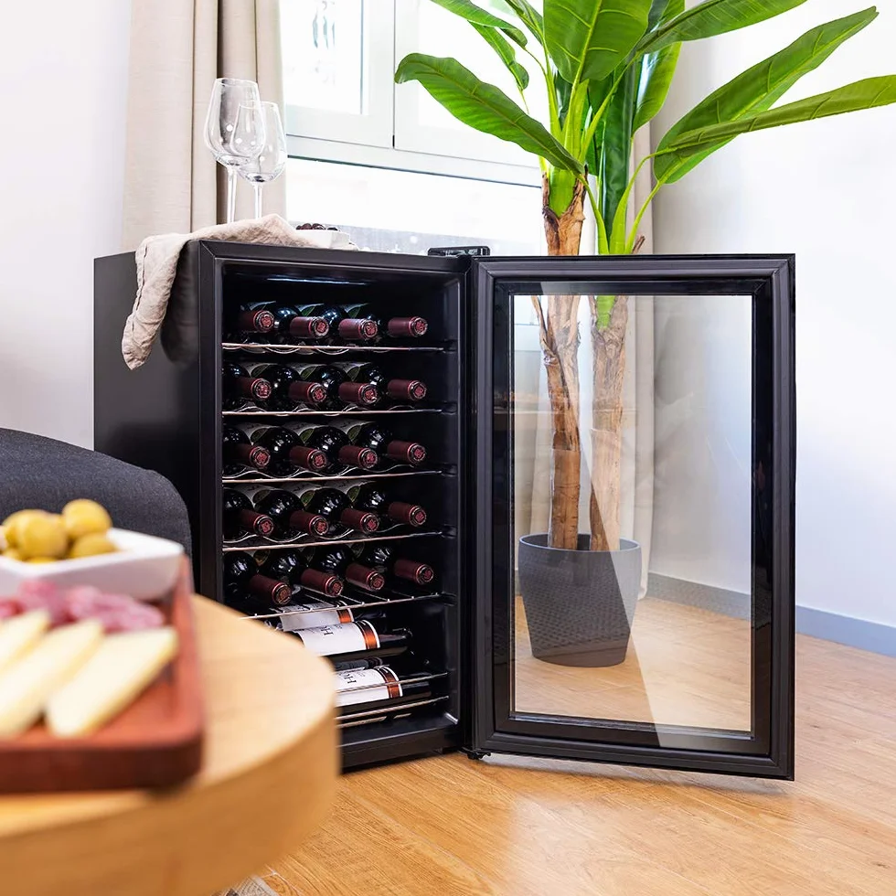 Cecotec Vinoteca 24 Botellas GrandSommelier 24000 Black. Compresor Silencioso, 5-18ºC, Control Táctil, Luz LED, Puerta Negra, Estantes Inox, Eficiencia Energética Clase G