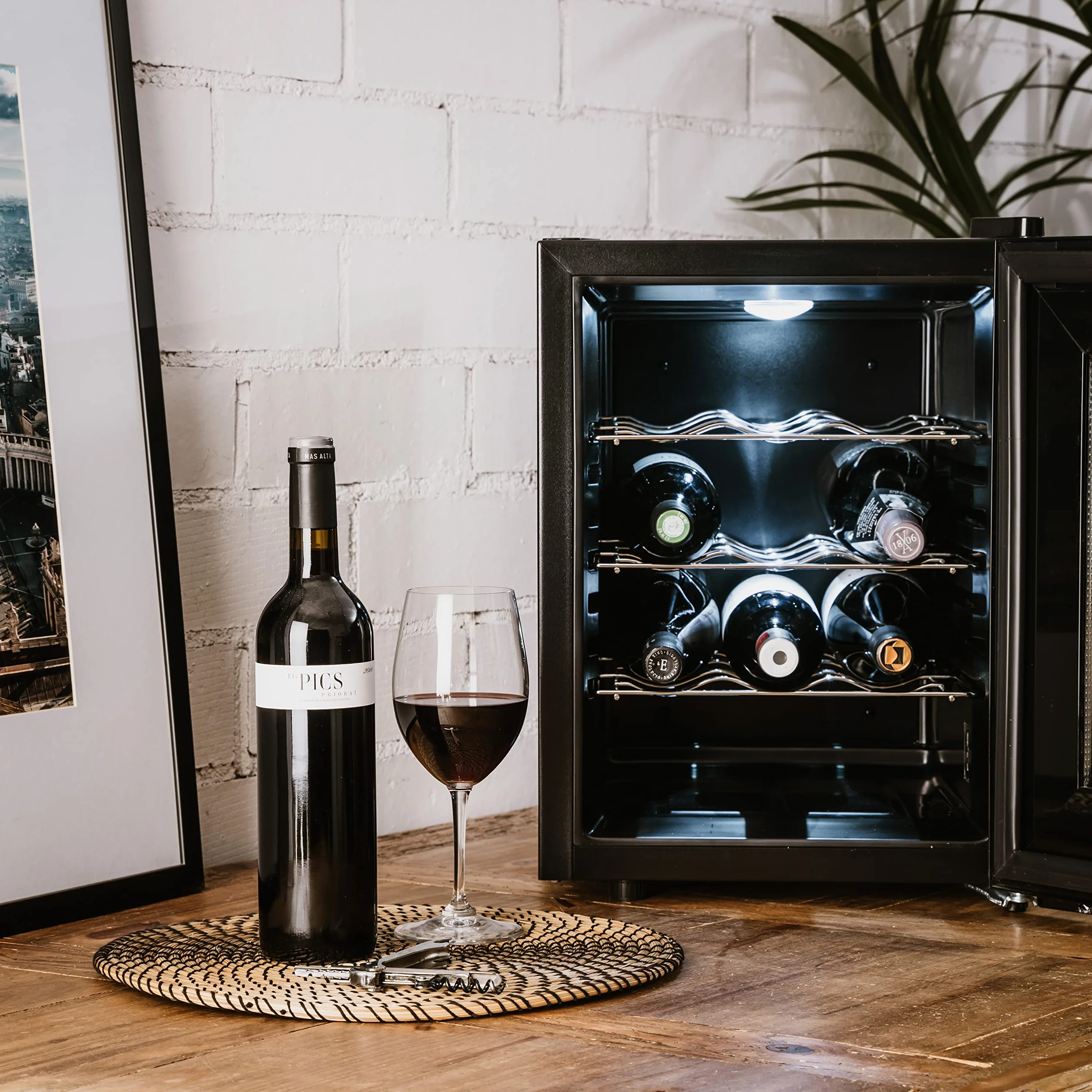 Taurus WC12T - Vinoteca termoeléctrica para 12 botellas, silenciosa, no vibra, aislamiento especial del interior, puerta de vidrio, temperatura regulable con panel táctil, suave luz interior, negro
